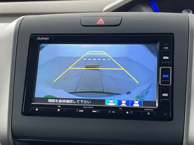 ホンダ フリード ハイブリット G ホンダセンシング 愛知県 2020(令2)年 6.7万km プラチナホワイトパール 禁煙車/純正7インチナビ/（DVD/CD/Bluetooth/フルセグTV/SD)/バックカメラ/ホンダセンシング/・衝突軽減ブレーキ/・レーダークルーズコントロール/・レーンキープアシスト/ドライブレコーダー/ETC/両側パワースライドドア/LEDヘッドライト/15インチアルミホイール/スマートキー/プッシュスタート/フロアマット/横滑り防止装置