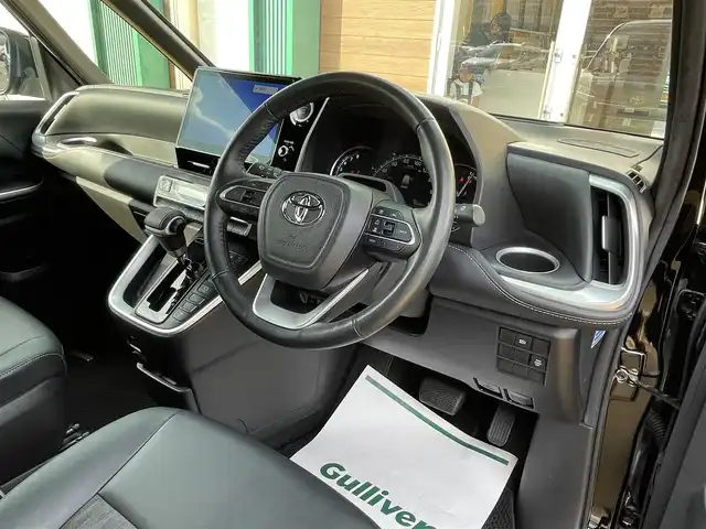 トヨタ ノア S－Z 宮崎県 2022(令4)年 4.3万km アティチュードブラックマイカ 純正10.5型ナビ/フルセグTV/両側パワースライドドア/パワーバックドア/パノラミックビューモニター/ビルトインETC2.0/ドライブレコーダー/駐車支援システム/パーキングサポートブレーキ/ブラインドスポットモニター/カラーヘッドアップディスプレイ/デジタルインナーミラー/プロジェクター式LEDヘッドランプ/デュアルオートエアコン/革巻きステアリング/ステアリングヒーター/ハーフレザーシート/前席/2列目シートヒーター/2列目オットマン/純正17インチアルミホイール/スマートエントリー/スタートシステム/禁煙車