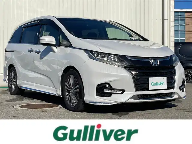 ホンダ オデッセイ アブソルート ホンダセンシング 富山県 2018(平30)年 7万km プラチナホワイトパール 純正ナビ／/フルセグＴＶ／/ＤＶＤ再生／/Ｂｌｕｅｔｏｏｔｈ／/バックカメラ／/ＨＤＭｉ入力端子／/運転席助手席シートヒーター／/運転席パワーシート／/レーダークルコン／/レーンキープアシスト／/ビルトインＥＴＣ/LEDオートライト/ＬＥＤフォグライト