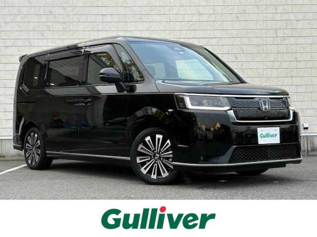 ホンダ ステップワゴン スパーダ eHEV プレミアムライン 大阪府 2022(令4)年 2.3万km クリスタルブラックパール 純正１５．６型フリップダウンモニター　/純正１１．４型ナビ　/全方位カメラ　/フルセグ/ブラインドスポットモニター/ホンダセンシング　/パワーバックドア　/両側パワースライドドア　/ドラレコ　/前席／後席シートヒーター　/ビルトインＥＴＣ　/オットマンチェア/スマートキー
