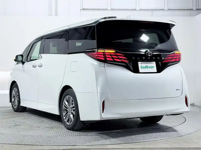 トヨタ アルファードハイブリット Z 大阪府 2024(令6)年 0.8万km プラチナホワイトパールマイカ サンルーフ トヨタチームメイト 衝突軽減B 360カメラ 後席モニター レーダークルーズC ハンドルヒーター 両側電動ドア パワーバックドア AC100V BSM ドラレコ プッシュスタート ETC