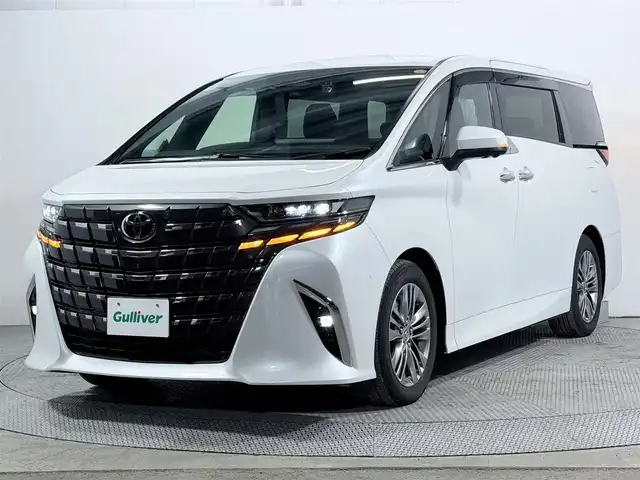 トヨタ アルファードハイブリット Z 大阪府 2024(令6)年 0.8万km プラチナホワイトパールマイカ サンルーフ トヨタチームメイト 衝突軽減B 360カメラ 後席モニター レーダークルーズC ハンドルヒーター 両側電動ドア パワーバックドア AC100V BSM ドラレコ プッシュスタート ETC
