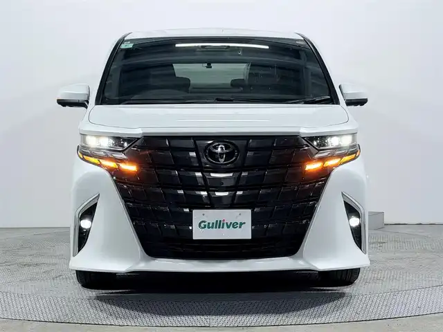 トヨタ アルファードハイブリット Z 大阪府 2024(令6)年 0.8万km プラチナホワイトパールマイカ サンルーフ トヨタチームメイト 衝突軽減B 360カメラ 後席モニター レーダークルーズC ハンドルヒーター 両側電動ドア パワーバックドア AC100V BSM ドラレコ プッシュスタート ETC