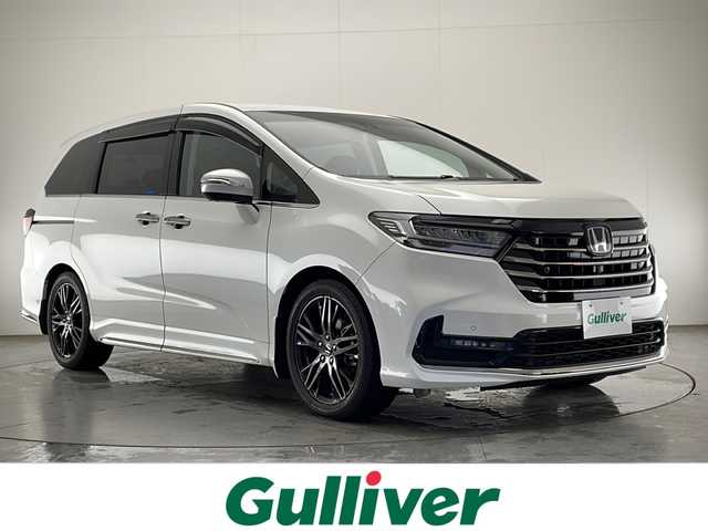 ホンダ オデッセイ ハイブリッド e:HEVアブソルート EX 宮崎県 2021(令3)年 3.9万km プラチナホワイトパール 禁煙車/ホンダセンシング/純正10型ナビTV/（VXU-217DYi/CD/DVD/Bluetooth/フルセグTV)/純正11/6型リアフリップダウンモニター/（VM-185EN）/純正ビルトイン2.0ETC/純正ドライブレコーダー/純正LEDオートライト/純正LEDフォグ/純正18インチアルミ/純正フロアマット/両側電動スライドドア/アダプティブクルーズコントロール/レーンディパーチャーアラート/ブラインドスポットモニター/クリアランスソナー/黒本革シート/ウッド調パネル/全方位モニター/パワーバックドア/前席パワーシート/Wオートエアコン/本革巻ハンドル/スマートキー/プッシュエンジンスタート/新車時保証書/取扱い説明書