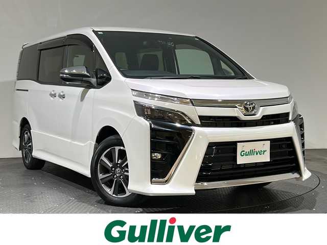 トヨタ ヴォクシー ZS 煌Ⅱ 愛媛県 2020(令2)年 1.1万km ホワイトパールクリスタルシャイン ・９型ナビ（フルセグＴＶ・ＢＴ・ＣＤ・ＤＶＤ・ＦＭ・ＡＭ・ＳＤ）/・バックカメラ　/・ＥＴＣ　/・前後ドラレコ　/・１２．１型後席モニター　/・クルーズコントロール　/・両側電動ドア　/・レーンキープアシスト　/・衝突軽減ブレーキ/・オートマチックハイビーム/・テレビキャンセラー/・スペアキー