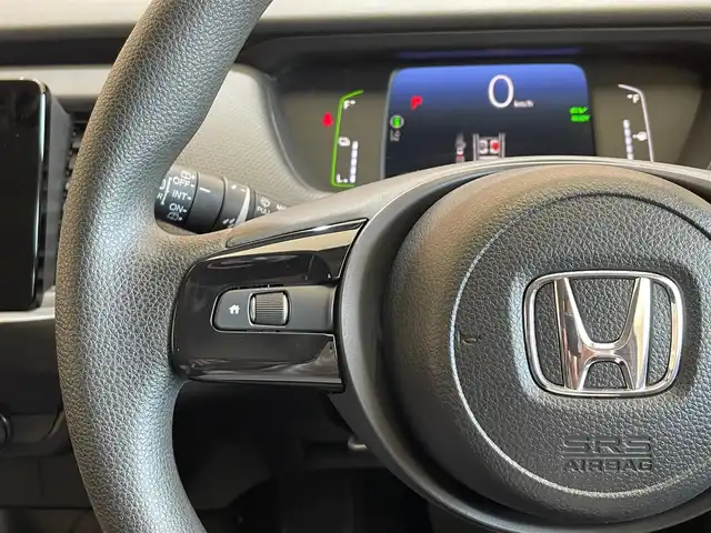 ホンダ フィット e:HEVベーシック 長野県 2023(令5)年 5.5万km クリスタルブラックパール ・4WD/Honda SENSING/・衝突軽減ブレーキ（CMBS）/・先行車発進お知らせ機能/・アダプティブクルーズコントロール/・車線維持支援システム（LKAS）/・ブラインドスポットインフォメーション/・社外ナビ/・Bluetooth/バックカメラ/・コンフォートパッケージ/・オートホールド/・ETC/・ビークルスタビリティアシスト/・オートライト/LEDライト/・横滑り防止