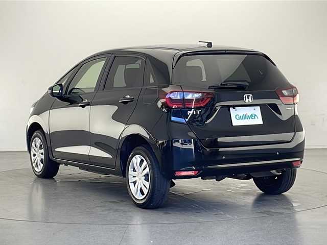 ホンダ フィット e:HEVベーシック 長野県 2023(令5)年 5.5万km クリスタルブラックパール 4WD/社外ナビ（FM/AM/Bluetooth/DISC/USB）/ホンダセンシング/・路外逸脱抑制機能/・踏み間違い衝突軽減システム/・パーキングセンサー警報/・衝突軽減ブレーキ/・先行車発進お知らせ機能/・標識認識機能/・パーキングセンサー/プッシュスタート/アイドリングストップ/スマートキー/AACエアコン/追従機能付きクルコン/ABS/横滑り防止装置/オートハイビーム/LEDヘッドライト/フロントガラス熱線/ドアミラーヒーター/電子パーキングブレーキ/オートブレーキホールド/ヘッドライトレベライザー/純正フロアマット/純正ホイールキャップ付きスチールホイール/保証書/取扱説明書