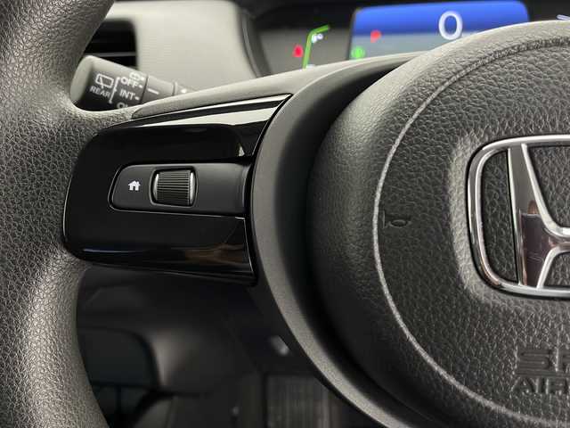 ホンダ フィット e:HEVベーシック 長野県 2023(令5)年 5.5万km クリスタルブラックパール 4WD/社外ナビ（FM/AM/Bluetooth/DISC/USB）/ホンダセンシング/・路外逸脱抑制機能/・踏み間違い衝突軽減システム/・パーキングセンサー警報/・衝突軽減ブレーキ/・先行車発進お知らせ機能/・標識認識機能/・パーキングセンサー/プッシュスタート/アイドリングストップ/スマートキー/AACエアコン/追従機能付きクルコン/ABS/横滑り防止装置/オートハイビーム/LEDヘッドライト/フロントガラス熱線/ドアミラーヒーター/電子パーキングブレーキ/オートブレーキホールド/ヘッドライトレベライザー/純正フロアマット/純正ホイールキャップ付きスチールホイール/保証書/取扱説明書