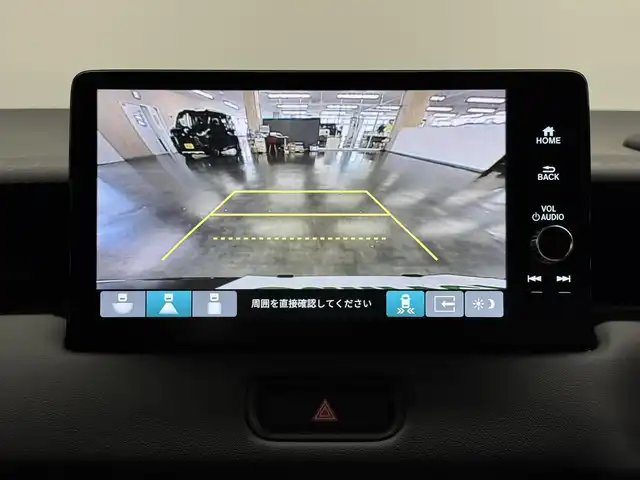 ホンダ ヴェゼル ハイブリッド e:HEV Z 三重県 2025(令7)年 0.1千km クリスタルブラックパール ハイブリッド/FF/MTモード付フロアCVT/純正 9インチナビ/（FM/AM/USB/Bluetooth/CarPlay/AndroidAuto/TV）/バックカメラ/ビルトイン ETC2.0/Honda SENSING/・衝突軽減ブレーキ（CMBS）/・先行車発進お知らせ機能/・路外逸脱抑制機能/・標識認識機能/・渋滞追従機能付アダプティブクルーズコントロール（ACC）/・車線維持支援システム（LKAS）/・トラフィックジャムアシスト（渋滞運転支援機能）/・ブラインドスポットインフォメーション/・誤発進抑制機能/・後方誤発進抑制機能/・近距離衝突軽減ブレーキ/・パーキングセンサーシステム/・【OP】後退出庫サポート/・アダプティブドライビングビーム/・ヒルディセントコントロール/装備/・ハンズフリーアクセスパワーテールゲート/・ハーフレザーシート/・シートヒーター（D/N）/・ステアリングヒーター/・オートライトシステム/・LEDヘッドライト/・LEDフロントフォグランプ/・左右独立オートエアコン/・自動防眩ルームミラー/・【OP】ワイヤレス充電器/・プッシュスタート/・純正18inAW/・保/取/・スマートキーx2/など