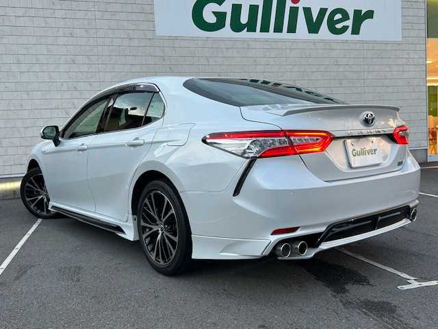 トヨタ カムリ WSレザーパッケージ 静岡県 2019(令1)年 2.6万km プラチナホワイトパールマイカ TRDフルエアロ/純正ディスプレイオーディオナビ/Bluetooth接続/フルセグTV/パドルシフト/バックカメラ/前方ドライブレコーダー/ビルトインETC/純正フロアマット/純正アルミホイール18インチ/前後コーナーセンサー/オートライト/オートマチックハイビーム/LEDヘッドライト/前席パワーシート/前席シートヒーター/レーダークルーズコントロール/ブラインドスポットモニター/横滑り防止装置/レーンキープアシスト/保証書/取扱説明書