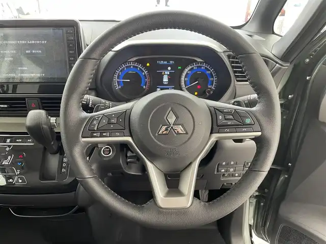 三菱 デリカミニ T プレミアム 滋賀県 2025(令7)年 0.1千km 緑Ⅱ 未使用車/純正９インチディスプレイオーディオ/Bluetooth/AppleCarPlay/AndoroidAuto/全方位カメラ/両側電動スライド/ハーフレザー/クリアランスソナー/LEDヘッドライト/オートライト/オートハイビーム/レーンキープ/シートヒーター（D/N）/ステアリングヒーター/ヒルディセントコントロール/電動パーキングブレーキ/オートブレーキホールド/DiM/衝突軽減/パドルシフト/プッシュスタート/スマートキー/ステアリングリモコン