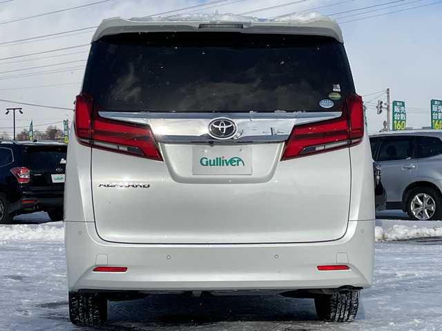 トヨタ アルファード G 道央・札幌 2018(平30)年 4.2万km ホワイトパールクリスタルシャイン ４WD/純正ディーラーOPナビ/CD/DVD/BT/フルセグ/トヨタセーフティセンス/プリクラッシュセーフティ/横滑り防止装置/レーダークルーズコントロール/レーンキープアシスト/クリアランスソナー/ブラインドスポットモニター/パーキングサポートブレーキ/ロードサインアシスト/バックカメラ/ビルトインETC/ドライブレコーダー/アイドリングストップ/ECOMODE/デジタルインナーミラー/両側パワースライドドア/パワーバックドア/前席/２列目パワーシート/D席メモリーシート/前席シートヒーター/前席エアシート/N席/２列目オットマン/レザーシート/革巻きウッドコンビステアリング/ステアリングリモコン/電動パーキング/ブレーキホールド/MTモード付AT/プッシュスタート/スマートキー/LEDヘッドライト/オートライト/オートハイビーム/フォグランプ/電動格納ミラー/ウィンカーミラー/純正フロアマット/ドアバイザー