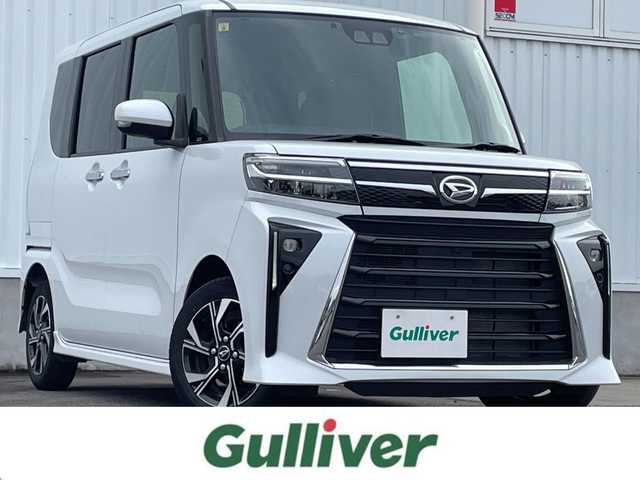 ダイハツ タント カスタム X 愛媛県 2023(令5)年 2.6万km シャイニングホワイトパール Bluetooth接続/ビルトインETC/両側パワスラ/パワーウィンドウ/純正ナビ/DVD再生可能/USB入力端子/レーンキープアシスト/前後コーナーセンサー/横滑り防止装置/シートヒーター/オートライト/バックカメラ/iPod接続可能/純正アルミホイール/アイドリングストップ/衝突被害軽減システム/ワンセグテレビ/純正フロアマット