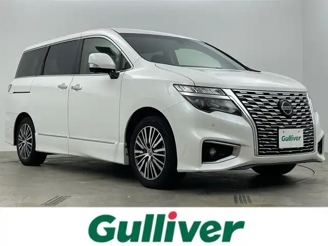 日産 エルグランド 250ハイウェイスターS 岡山県 2021(令3)年 4.8万km ピュアホワイトパール 純正１０インチナビ　/・（CD/DVD/BT/フルセグTV）/１１インチフリップダウンモニター　/衝突軽減ブレ―キシステム　/両側電動スライドドア　/レーダークルーズコントロール　/アラウンドビューモニター　/ビルドインＥＴＣ　/純正ＬＥＤヘッドライト/ブラインドスポットモニター/コーナーセンサー/ハーフレザー/USB/オートライト/オートハイビーム