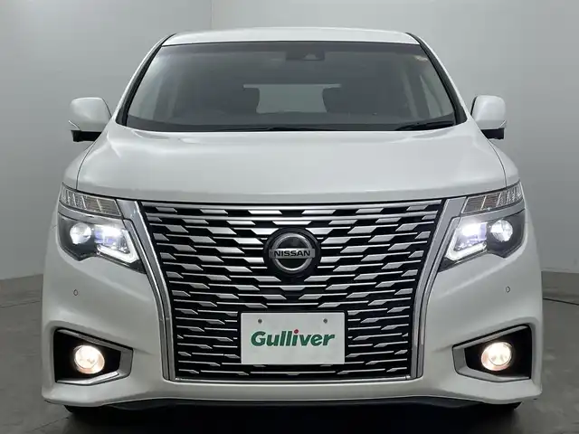 日産 エルグランド 250ハイウェイスターS 岡山県 2021(令3)年 4.8万km ピュアホワイトパール 純正１０インチナビ　/・（CD/DVD/BT/フルセグTV）/１１インチフリップダウンモニター　/衝突軽減ブレ―キシステム　/両側電動スライドドア　/レーダークルーズコントロール　/アラウンドビューモニター　/ビルドインＥＴＣ　/純正ＬＥＤヘッドライト/ブラインドスポットモニター/コーナーセンサー/ハーフレザー/USB/オートライト/オートハイビーム