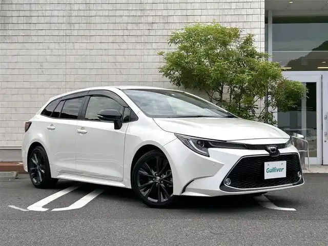トヨタ カローラツーリング ダブルバイビー 愛媛県 2020(令2)年 3.8万km ホワイトパールクリスタルシャイン 純正ディスプレイオーディオ/・Bluetooth/・USB/・FM/AM/・Miracast/ビルトインETC/バックカメラ/前後コーナーセンサー/スペアキー/ブラインドスポットモニター/レーダークルーズコントロール/純正１７インチアルミホイール/革巻きステアリング/ステアリングスイッチ/フォグランプ/オートライト/オートマチックハイビーム/電動サイドブレーキ/ブレーキホールドスイッチ/ヘッドライトレベライザー/純正フロアマット/ドアバイザー