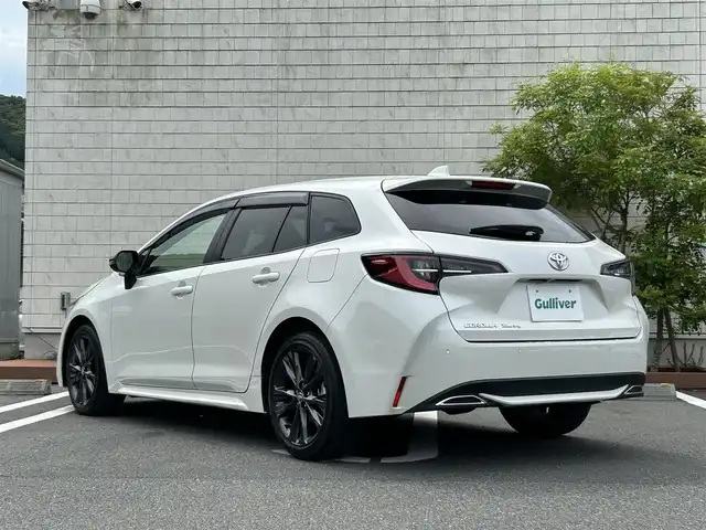トヨタ カローラツーリング ダブルバイビー 愛媛県 2020(令2)年 3.8万km ホワイトパールクリスタルシャイン 純正ディスプレイオーディオ/・Bluetooth/・USB/・FM/AM/・Miracast/ビルトインETC/バックカメラ/前後コーナーセンサー/スペアキー/ブラインドスポットモニター/レーダークルーズコントロール/純正１７インチアルミホイール/革巻きステアリング/ステアリングスイッチ/フォグランプ/オートライト/オートマチックハイビーム/電動サイドブレーキ/ブレーキホールドスイッチ/ヘッドライトレベライザー/純正フロアマット/ドアバイザー
