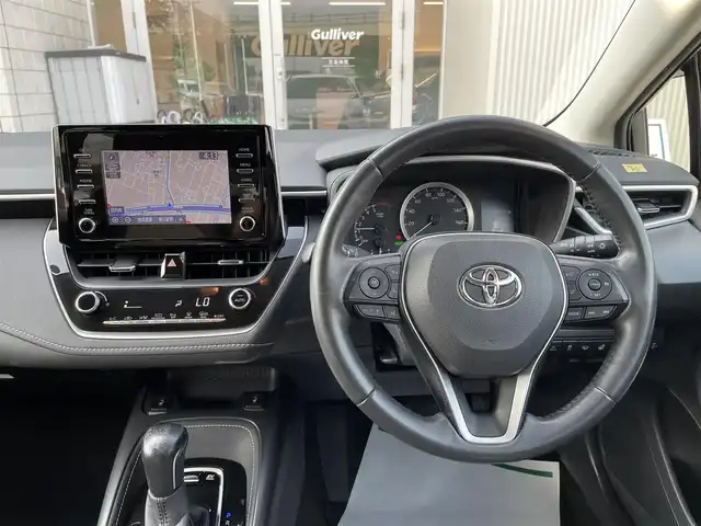 トヨタ カローラツーリング ハイブリッド S 石川県 2019(令1)年 8.4万km ホワイトパールクリスタルシャイン 4WD/純正ディスプレイオーディオ/ナビ/バックカメラ/トヨタセーフティセンス/レーダークルーズ/ETC/シートヒーター/ハンドルヒーター/純正アルミホイール/スマートキー/プッシュスタート/LEDヘッドライト/AC100V