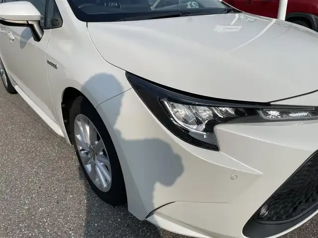トヨタ カローラツーリング ハイブリッド S 石川県 2019(令1)年 8.4万km ホワイトパールクリスタルシャイン 4WD/純正ディスプレイオーディオ/ナビ/バックカメラ/トヨタセーフティセンス/レーダークルーズ/ETC/シートヒーター/ハンドルヒーター/純正アルミホイール/スマートキー/プッシュスタート/LEDヘッドライト/AC100V