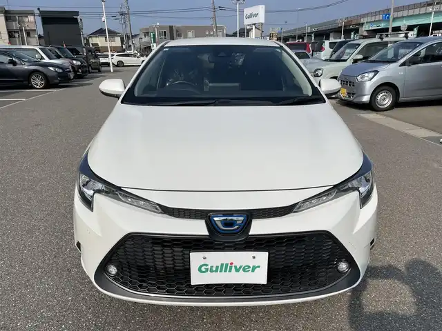 トヨタ カローラツーリング ハイブリッド S 石川県 2019(令1)年 8.4万km ホワイトパールクリスタルシャイン 4WD/純正ディスプレイオーディオ/ナビ/バックカメラ/トヨタセーフティセンス/レーダークルーズ/ETC/シートヒーター/ハンドルヒーター/純正アルミホイール/スマートキー/プッシュスタート/LEDヘッドライト/AC100V