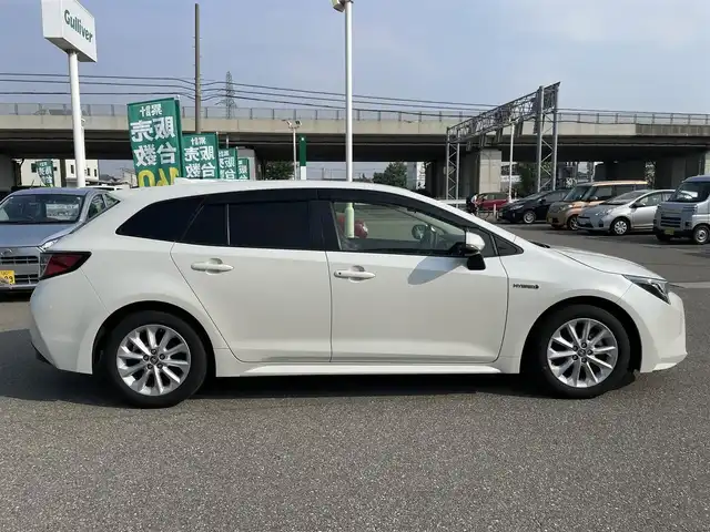 トヨタ カローラツーリング ハイブリッド S 石川県 2019(令1)年 8.4万km ホワイトパールクリスタルシャイン 4WD/純正ディスプレイオーディオ/ナビ/バックカメラ/トヨタセーフティセンス/レーダークルーズ/ETC/シートヒーター/ハンドルヒーター/純正アルミホイール/スマートキー/プッシュスタート/LEDヘッドライト/AC100V