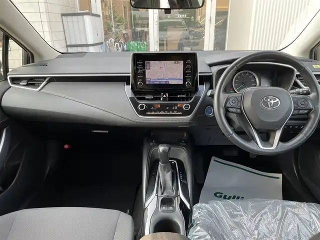 トヨタ カローラツーリング ハイブリッド S 石川県 2019(令1)年 8.4万km ホワイトパールクリスタルシャイン 4WD/純正ディスプレイオーディオ/ナビ/バックカメラ/トヨタセーフティセンス/レーダークルーズ/ETC/シートヒーター/ハンドルヒーター/純正アルミホイール/スマートキー/プッシュスタート/LEDヘッドライト/AC100V