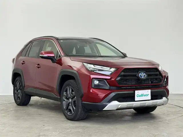 トヨタ ＲＡＶ４ ハイブリッド アドベンチャー 埼玉県 2024(令6)年 2.5万km センシュアルレッドマイカ Toyota Safety Sense/パノラマルーフ/パノラミックビューモニター/10.5インチディスプレイオーディオ/【USB/Bluetooth/AppleCarPlay/AndroidAuto】/コネクティッドナビ/レザーシート/シートベンチレーション/シートヒーター/パワーシート/ステアリングヒーター/AC100Vコンセント/LEDオートライト/サイドエアバッグ/カーテンエアバッグ/ETC2.0