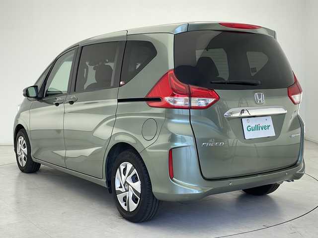 ホンダ フリード ハイブリット G 千葉県 2023(令5)年 1.4万km 緑 福祉車両/サイドリフトアップシート/ホンダセンシング/　レーダークルーズコントロール/衝突軽減ブレーキ/　レーンキープアシスト/クリアランスソナー/　先行車発進告知/標識認識機能/純正メモリナビ（VXM-237VFNi）/　Bluetooth/フルセグTV/AppleCareplay/　CD/DVD/USB/ビルトインETC/バックカメラ/純正ドライブレコーダー（前後）/前席シートヒーター/ロールサンシェード/純正フロアマット/両側パワースライドドア/LEDヘッドライト/オートライト/スペアキー1本
