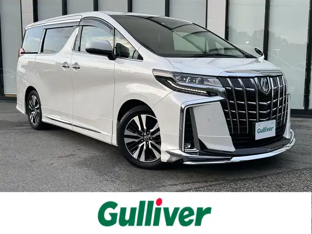 トヨタ アルファード S Aパッケージ 大阪府 2018(平30)年 2.5万km ホワイトパールクリスタルシャイン 純正10インチナビ/　（フルセグTV/CD/DVD/HDMI/Bluetooth/USB）/バックカメラ/ツインムーンルーフ　/モデリスタエアロ/　（フロント/サイド/リア）　/トヨタセーフティセンス/クリアランスソナー　/純正12インチフリップダウンモニター/前席パワーシート/　（シートヒーター/シートベンチレーション/オットマン）/デジタルインナーミラー　/ステアリングヒーター　/三眼LEDヘッドライト/LEDフォグランプ/クルーズコントロール/レーンキープアシスト/両側パワースライドドア/パワーバックドア/純正18インチアルミホイール/純正フロアマット/ビルトインETC