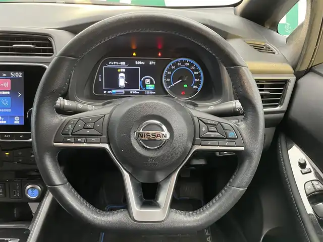 日産 リーフ X Vセレクション 鹿児島県 2021(令3)年 3.3万km ブリリアントホワイトパール/オーロラフレアブルーパール 2トーン 禁煙車/純正ナビ/(フルセグTV/Bluetooth/AppleCarPlay/AndroidAuto)/アラウンドビューモニター/デジタルインナーミラー/インテリジェント エマージェンシーブレーキ/LDW（車線逸脱警報）/ヒルスタートアシストフロント&バックソナー/標識検知機能（進入禁止）/踏み間違い衝突防止アシスト/インテリジェント BSI（後側方衝突防止支援システム）/BSW（後側方車両検知警報）/RCTA（後退時車両検知警報）/インテリジェント LI（車線逸脱防止支援システム）/インテリジェント DA（ふらつき警報）/プロパイロット/全席シートヒーター/ステアリングヒーター/ドライブレコーダー/ETC/電動格納ミラー