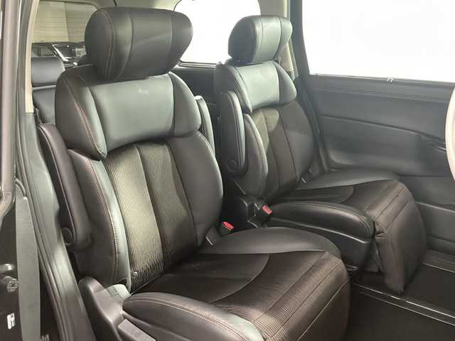 日産 エルグランド 250ハイウェイスターS 広島県 2017(平29)年 6.9万km ファントムブラック 禁煙車/純正ナビ/全周囲カメラ/後席フリップダウンモニター/純正エアロ/パワースライドドア/１００Ｖ給電/ＭＴモード付ＡＴシフト/ＥＴＣ/フルセグ/オットマン/クルーズコントロール/ＬＥＤヘッドライト/フォグランプ/エアバッグ(運転席/助手席/サイド/カーテン)/純正18インチアルミホイール(225/55/R18)