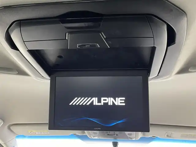 トヨタ アルファード S 千葉県 2015(平27)年 3.7万km ホワイトパールクリスタルシャイン 禁煙車/クリアランスソナー/クルーズコントロール/片側パワースライドドア/アルパイン１２.８型フリップダウンモニター/純正９型メモリナビ/・型番：NSZT-Y64T/・CD/DVD/Bluetooth/フルセグTV/・バックカメラ/・ビルトインETC/革巻きステアリング/・ステアリングスイッチ/MT付きAT/レザー風シートカバー/電子パーキング/・ブレーキホールド/社外フロアマット/純正１８インチAW/オートライト/・LEDヘッドライト/・フォグランプ