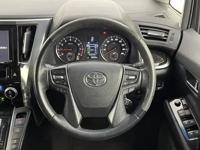 トヨタ アルファード S 千葉県 2015(平27)年 3.7万km ホワイトパールクリスタルシャイン 禁煙車/クリアランスソナー/クルーズコントロール/片側パワースライドドア/アルパイン１２.８型フリップダウンモニター/純正９型メモリナビ/・型番：NSZT-Y64T/・CD/DVD/Bluetooth/フルセグTV/・バックカメラ/・ビルトインETC/革巻きステアリング/・ステアリングスイッチ/MT付きAT/レザー風シートカバー/電子パーキング/・ブレーキホールド/社外フロアマット/純正１８インチAW/オートライト/・LEDヘッドライト/・フォグランプ
