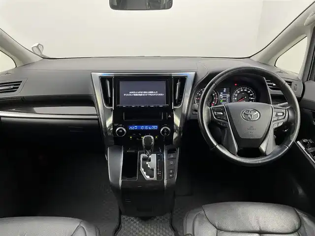 トヨタ アルファード S 千葉県 2015(平27)年 3.7万km ホワイトパールクリスタルシャイン 禁煙車/クリアランスソナー/クルーズコントロール/片側パワースライドドア/アルパイン１２.８型フリップダウンモニター/純正９型メモリナビ/・型番：NSZT-Y64T/・CD/DVD/Bluetooth/フルセグTV/・バックカメラ/・ビルトインETC/革巻きステアリング/・ステアリングスイッチ/MT付きAT/レザー風シートカバー/電子パーキング/・ブレーキホールド/社外フロアマット/純正１８インチAW/オートライト/・LEDヘッドライト/・フォグランプ