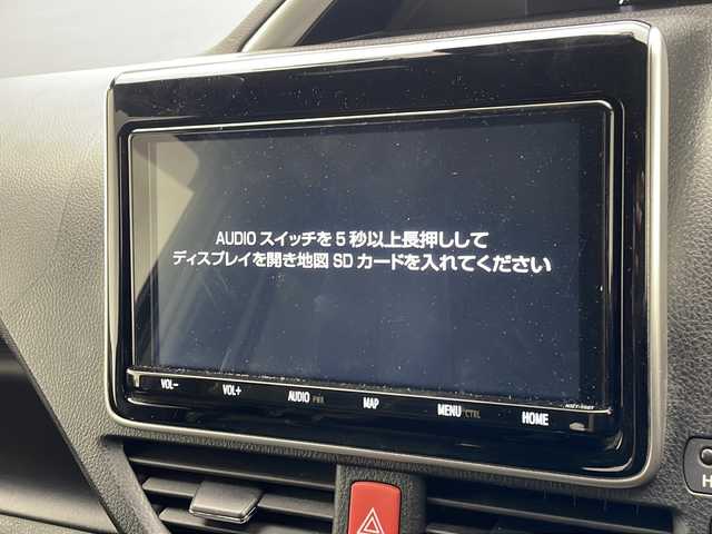 トヨタ ヴォクシー ハイブリッド ZS 煌Ⅱ 沖縄県 2020(令2)年 6.6万km イナズマスパーキングブラックガラスフレーク 純正９インチナビ（NSZT-Y68T）/(ＣＤ／ＤＶＤ/フルセグＴＶ/Ｂｌｕｅｔｏｏｔｈ)/純正フリップダウンモニター/バックカメラ/前後ドライブレコーダー/シートヒーター/純正アルミ（積込）/レザー調シートカバー/両側パワースライド/スペアキー/社外フロアマット/LEDヘッドライト