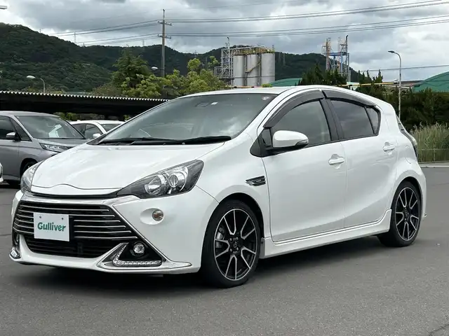 トヨタ アクア G G’s 岡山県 2016(平28)年 4.1万km ライムホワイトパールクリスタルシャイン 純正メモリーナビ/CD/DVD/Bluetooth/フルセグTV/バックカメラ/トヨタセーフティセンス/レーンキープアシスト/プリクラッシュセーフティ/ハイビームアシスト/クルーズコントロール　/横滑り防止装置　/LEDオートライト　/ハーフレザースポーツシート/シートヒーター/ETC　/カーテンエアバック　/スマートキー×2