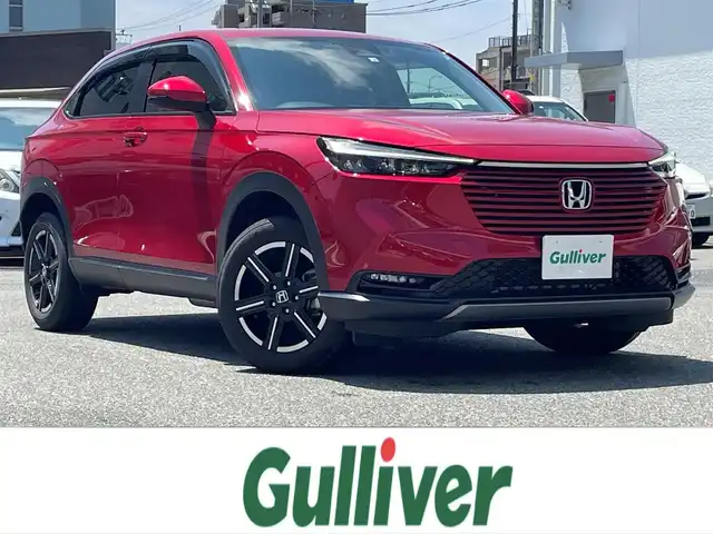 ホンダ ヴェゼル G 福岡県 2022(令4)年 1.7万km プレミアムクリスタルレッドM 純正ディーラーナビ/Bluetooth対応/フルセグTV/AM/FM/置くだけ充電/クルーズコントロール/ダウンヒルアシストコントロール/バックカメラ/ビルトインETC/純正アルミホイール/純正フロアマット/コーナーセンサー/プッシュスタート/ドアバイザー/アイドリングストップ/保証書/取扱説明書/スマートキー