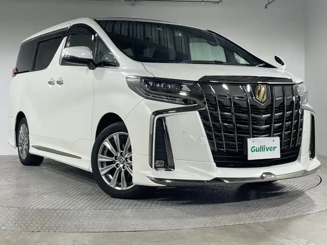 トヨタ アルファード S タイプゴールドⅢ 神奈川県 2023(令5)年 5.1万km ホワイトパールクリスタルシャイン 純正9型ディスプレイオーディオ/コネクトナビ/AM FM CD　USB　Bluetooth　Miracast/バックカメラ/ツインムーンルーフ/両側電動スライドドア/パワーバックドア/純正12.1型後席モニター【V12T-R68C】/AC100Vアクセサリーコンセント/モデリスタエアロ【フロント/サイド/リアアンダー】/セーフティセンス/プリクラッシュセーフティ/ロードサインアシスト/レーダークルーズコントロール/レーントレーシングアシスト/アダブティブハイビームシステム/ブラインドスポットモニター/パーキングサポートブレーキ/リヤクロストラフィックアラート/先行車発進告知/前後クリアランスソナー/純正前後ドライブレコーダー/ナノイー/ハーフレザーシート/2列目オットマン/革巻きステアリング/ビルトインETC/電子パーキング　オートホールド/プッシュスタート/スマートキー/3眼LEDヘッドライト/オートライト/LEDフロントフォグランプ/純正18インチアルミホイール/シーケンシャルターンランプ/純正リアスポイラー/取説　ナビ取説/保証書/スペアキー/リアリモコン
