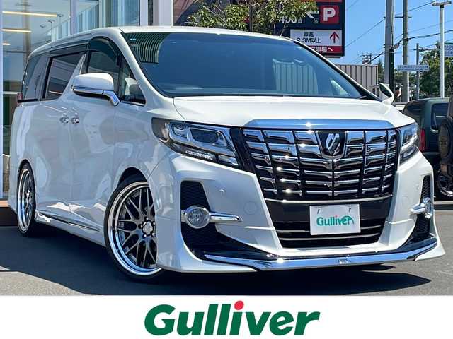 トヨタ アルファード S Aパッケージ 道央・札幌 2017(平29)年 1.8万km ホワイトパールクリスタルシャイン ・４WD/・ワンオーナー/・寒冷地仕様/・モデリスタエアロ/・社外SDナビ/　CD・DVD・SD・AUX・Bluetooth/・フルセグTV/・バックカメラ/・アイドリングストップ/・クルーズコントロール/・ビルトインETC/・スマートキー/・オットマン/・横滑り防止/・ステアリングスイッチ/・電動格納ミラー/・ウィンカーミラー/・ドアバイザー/・LEDヘッドライト/・フォグランプ/・ワイパー熱線/・社外マフラー/・取扱説明書/・保証書/・スペアキー