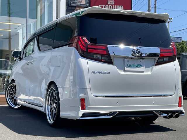 トヨタ アルファード S Aパッケージ 道央・札幌 2017(平29)年 1.8万km ホワイトパールクリスタルシャイン ・４WD/・ワンオーナー/・寒冷地仕様/・モデリスタエアロ/・社外SDナビ/　CD・DVD・SD・AUX・Bluetooth/・フルセグTV/・バックカメラ/・アイドリングストップ/・クルーズコントロール/・ビルトインETC/・スマートキー/・オットマン/・横滑り防止/・ステアリングスイッチ/・電動格納ミラー/・ウィンカーミラー/・ドアバイザー/・LEDヘッドライト/・フォグランプ/・ワイパー熱線/・社外マフラー/・取扱説明書/・保証書/・スペアキー