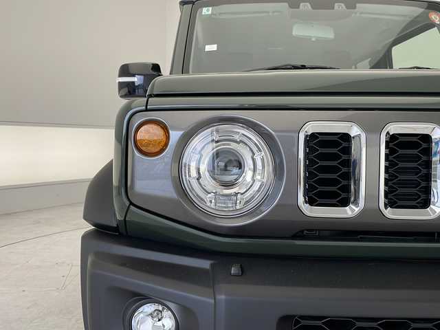 スズキ ジムニー ノマド FC 愛知県 2025(令7)年 0.1千km Ｄグリーン 登録済未使用車/衝突軽減システム/レーダークルーズコントロール/シートヒーター/コーナーセンサー/純正アルミホイール/LEDヘッドライト/ダウンヒルアシストコントロール/オートマチックハイビーム/４WD/ステアリングスイッチ/スマートキー/プッシュスタート