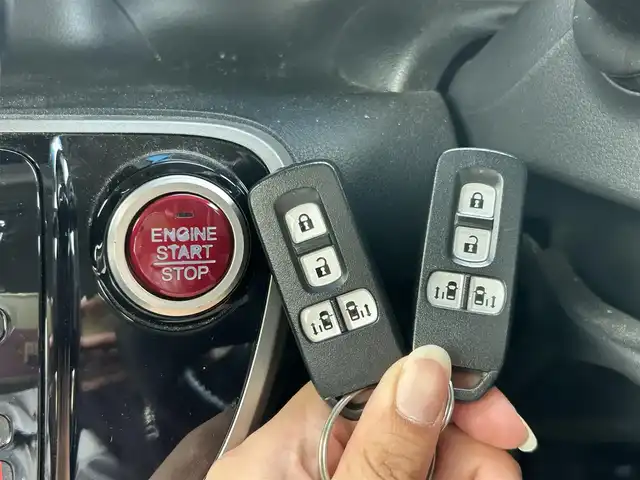 ホンダ Ｎ ＢＯＸ カスタム G ターボパッケージ 石川県 2012(平24)年 7.9万km プレミアムディープロッソパール ターボ車/純正メモリナビ/(AM/FM/CD/DVD/BT/iPod)/バックカメラ/両側パワースライドドア/クルーズコントロール/横滑り防止装置/盗難防止装置/ルーフコンソール/ETC/プッシュスタート/スマートキー/スペアキー×１/純正フロアマット/純正15インチアルミホイール/保証書/取扱説明書
