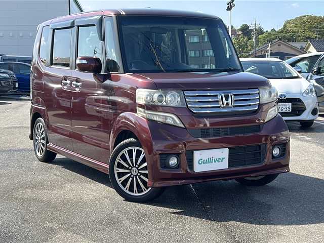 ホンダ Ｎ ＢＯＸ カスタム G ターボパッケージ 石川県 2012(平24)年 7.9万km プレミアムディープロッソパール ターボ車/純正メモリーナビゲーション/(AM/FM/CD/DVD/BT/iPod)/バックカメラ/両側パワースライドドア/ステアリングリモコン/・クルーズコントロール/・パドルシフト/キセノンヘッドライト/・オートライト/・フォグランプ/横滑り防止装置/盗難防止装置/ルーフコンソール/ETC/プッシュスタート/スマートキー/スペアキー×１/純正フロアマット/純正15インチアルミホイール/保証書/取扱説明書