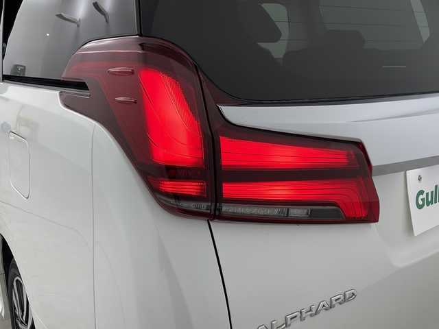 トヨタ アルファード S Cパッケージ 愛知県 2020(令2)年 3.1万km ホワイトパールクリスタルシャイン /禁煙車//純正9インチナビ//フルセグTV//ETC//バックカメラ//ツインムーンルーフ(フロントチルト&リヤ電動スライド)//トヨタセーフティセンス//プリクラッシュセーフティ//レーントレーシングアシスト//レーダークルーズコントロール//ロードサインアシスト//アダプティブハイビームシステム//発進遅れ告知//インテリジェントクリアランスソナー//パーキングサポートブレーキ//スーパーUV&IRカットガラス//ブラックエクステンション3眼LEDヘッドライト//オートライト//LEDフォグランプ//両側ワンタッチパワースライドドア//合皮+メタルウッド+スパッタリング内装//合皮シート//前席パワーシート(快適温熱+ベンチレーション付)//運転席ポジションメモリー//2列目エグゼクティブパワーシート//2列目パワーオットマン//3列目スペースアップシート//本革コンビステア//ステアスイッチ//ステアヒーター//プッシュスタート//電動格納ミラーウィンカー//電子パーキングブレーキ//ブレーキホールド//イモビライザー