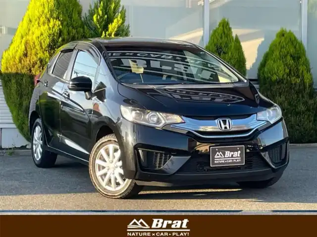 ホンダ フィット ハイブリット Lパッケージ 岩手県 2014(平26)年 9.2万km クリスタルブラックパール 純正メモリーナビ/（フルセグTV/CD/DVD/Bluetooth）/バックカメラ/クルーズコントロール/ステアリングリモコン/フロントワイパーデアイサー/電動格納ミラー/LEDヘッドライト/純正フロアマット/ドアバイザー