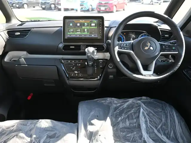 三菱 デリカミニ T プレミアム 千葉県 2025(令7)年 0.1千km 緑Ⅱ T　PREMIUM　9型ディスプレイオーディオ（121/330）　サイドデカール（33440）/e-Assist/・衝突被害軽減ブレーキシステム（FCM）/・車線逸脱警報システム（LDW）/・誤発進抑制機能（前進＆後退時）（UMS）/・レーダークルーズコントロールシステム（ACC）/・オートマチックハイビーム[AHB]/マイパイロット/デジタルインナーミラー/ハンズフリー両側パワースライドドア/ハーフレザーシート/前席シートヒーター/ディスプレイオーディオ/【Bluetooth接続】/【Apple CarPlay　Android Auto対応】/マルチアラウンドモニター/革巻きステアリング/ステアリングヒーター/ステアリングスイッチ/LEDヘッドライト/フォグライト/純正15インチアルミホイル/サイド/カーテンエアバッグ/キーレスオペレーションシステム