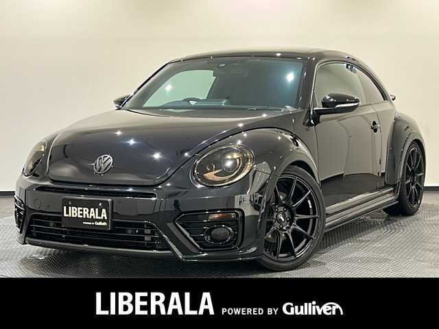 フォルクスワーゲン ザ・ビートル 2．0Rラインマイスター 新潟県 2019(令1)年 2.7万km ディープブラックパールエフェクト レザーシートパッケージ/・スポーツシート/・シートヒーター（D席/N席）/Volkswagen純正ナビゲーションシステム/・CD/DVD/AM/FM/TV/Bluetooth/ブラインドスポットディテクション（後方死角検知機能）/ドライバー疲労検知システム/パークディスタンスコントロール（フロント/リヤ）/リヤトラフィックアラート/バックモニター/ETC/ドライブレコーダー/ESC（エレクトロニック・スタビリティ・コントロール）/ブレーキアシスト/パドルシフト/クルーズコントロール/2.0 R-Line専用リヤスポイラー/R-Line専用エクステリア/・ドアミラー〈ブラック〉、サイドモールディング〈ブラック〉、リヤディフューザー〈ブラック）/ヘッドライトスモークフィルム/社外ホイール（SSR）/社外マフラー(einsatz)/社外サスペンション