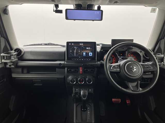 スズキ ジムニー XC 群馬県 2022(令4)年 2.4万km ミディアムグレー ４ＷＤターボ　アルパイン９型ディスプレイオーディオ　ＥＴＣ　ドラレコ　電子ミラー　衝突被害軽減システム　シートヒーター　クルーズコントロール　ダウンヒルアシスト　ＪＩＭＫＥＮＴＡＣマフラー　禁煙車