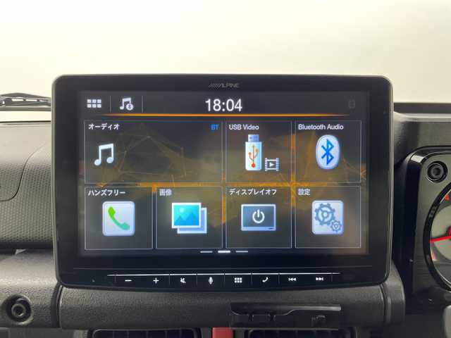 スズキ ジムニー XC 群馬県 2022(令4)年 2.4万km ミディアムグレー ４ＷＤターボ　アルパイン９型ディスプレイオーディオ　ＥＴＣ　ドラレコ　電子ミラー　衝突被害軽減システム　シートヒーター　クルーズコントロール　ダウンヒルアシスト　ＪＩＭＫＥＮＴＡＣマフラー　禁煙車