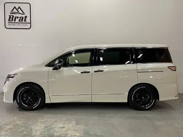 日産 エルグランド 250ハイウェイスターS 福島県 2020(令2)年 2.4万km ブリリアントホワイトパール AIS検査済み/【2502040650】/純正SDナビ/ワンセグテレビ/社外フリップダウンモニター/レーダークルーズコントロール/両側パワースライドドア/純正LEDヘッドライト/ハーフレザーシート/オットマンシート/クリアランスソナー/エマージェンシーブレーキ/オートマチックハイビーム/ワンタッチオートスライドドア/リアサンシェード/社外18インチAW　MID EXCLUSIVE 820F（社外）/TOYOオープンカントリーR/T　225/60-18（新品）（社外）/社外パーツ取付済